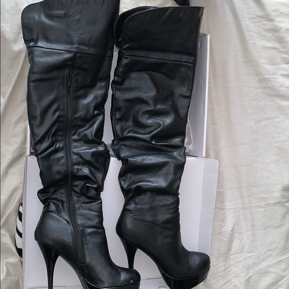 Black thigh high boots